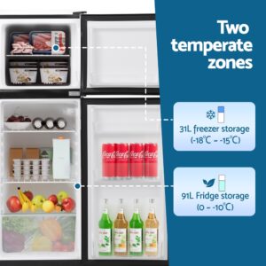Open Compartments Showing Crystal Shelving Inside Devanti 122L Two Door Fridge