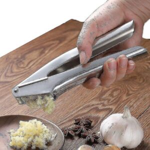 Stainless Steel Garlic Crusher Fully Opened At 180 Degrees For Easy Cleaning