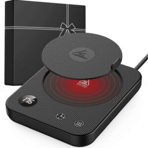 Smart Electric Coffee Beverage Warmer with a protective silicone pad on an office desk