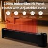 Slim black 2200W graphene floor heater standing in a modern living room