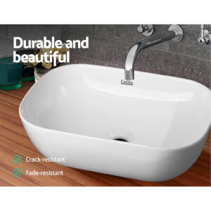 Cefito ceramic oval bathroom vanity basin sink with chrome tap on dark vanity top