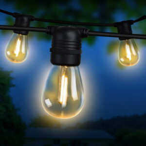 23m Outdoor LED Festoon String Lights illuminating a backyard wedding reception at night