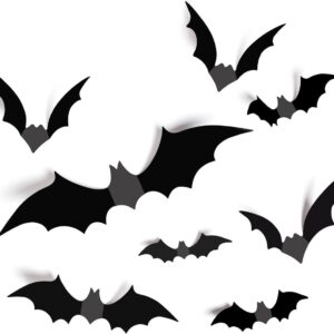 12-piece 3D LED Halloween bat decorations glowing on a living room wall