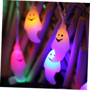 Illuminated LED ghost string light for Halloween hanging on a wall