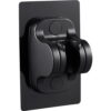 Black adhesive waterproof handheld shower head holder mounted on a white tile wall