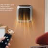 Blue Wall Mounted Ptc Space Heater Plugged Into Wall Outlet With Active Lcd Screen