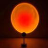 Sunset Projection Floor Lamp creating rainbow light effect on wall