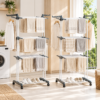 White 3-tier rolling clothes drying rack with grey accents, steel frame, for laundry and garment drying.