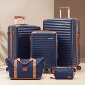 Wanderlite 4-piece navy blue luggage set: 3 hard-shell suitcases with tan trim, duffel bag, and toiletry bag for travel.