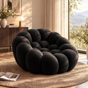 Black bubble-shaped modular armchair, upholstered in textured fabric, for modern living room seating.