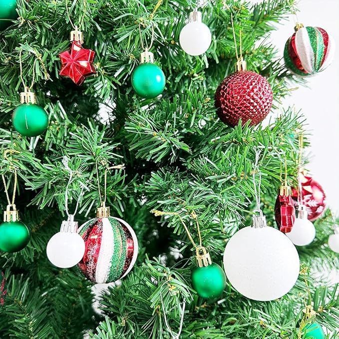 44-Piece Christmas Tree Ornaments Set - Multi – Sumo Deals Assorted Plastic Christmas Ornaments: Red Star, Green, White, And Striped Baubles On A Green Artificial Tree.