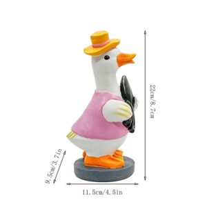 Duck House Garden Statue | Weatherproof Outdoor Decor – Sumo Deals Resin Duck Figurine, White With Pink Shirt, Yellow Hat, And Black Bag, For Home Decor.