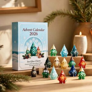 2026 Advent Calendar with 24 handcrafted sea-glass gnome charms in various colors for holiday countdown.