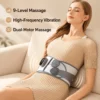 White & grey PU leather electric massage belt with dual motors for back pain relief, worn by woman on sofa.