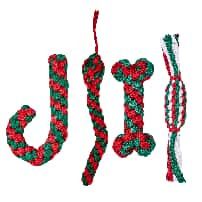 4 festive red/green/white braided rope dog chew toys: candy cane, snake, bone, and twisted stick for holiday play.