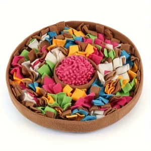 Round brown felt snuffle mat with colorful fabric strips and a pink spiky center for pet enrichment.