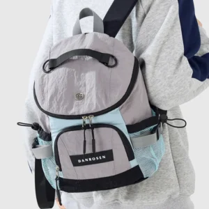 DANROSEN gray/light blue nylon mini backpack with front pocket & mesh side pockets, for casual everyday use.