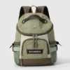 DANROSEN olive green & brown nylon backpack with front pocket, mesh side pockets, for travel or daily use.