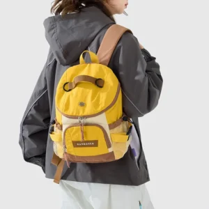 Danrosen Yellow Nylon Mini Backpack With Brown Accents, Front Pocket, And Mesh Side Pockets For Daily Use.