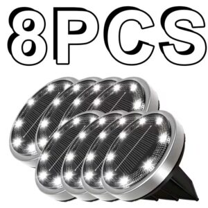 8PCS silver metal solar ground lights with 12 bright LEDs, black solar panel, for outdoor garden path lighting.
