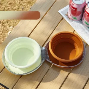 Collapsible silicone pet bowls, light green & brown, in grey mesh case for travel & outdoor feeding.