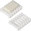 Two white plastic bar soap dishes, one holding a beige soap bar, for bathroom or kitchen use.