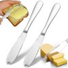 Set of 2 stainless steel silver butter knives with serrated edge and holes for spreading and slicing butter.