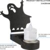 Black wooden ghost Halloween decoration with LED candle, for festive home decor.