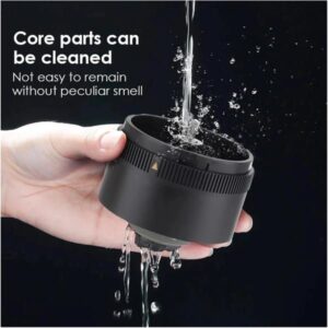 Handheld Black Plastic Coffee Grinder Being Rinsed Under Running Water For Easy Cleaning.