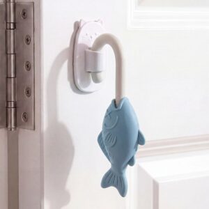 White cat-shaped adhesive door stopper with blue fish silicone bumper, child safety door guard.