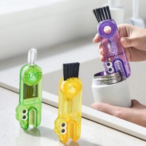 Cute Transparent Plastic Bottle Cleaning Brushes In Green, Yellow, And Purple, With Small And Large Bristles.