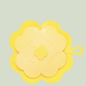 Yellow flower-shaped silicone pot lid/cup cover with handle, two-tone petals, for kitchen use.