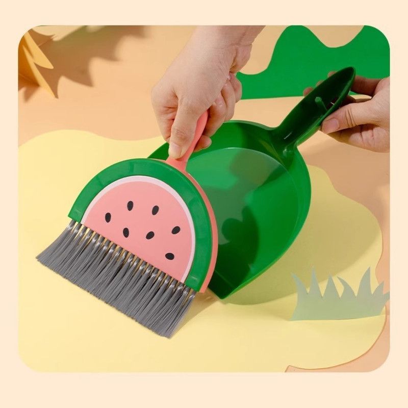 Mini Broom And Dustpan Set – Green Desktop Cleaner – Sumo Deals Kids' Watermelon-Themed Plastic Dustpan And Brush Set With Pink Handle, Green Dustpan, And Gray Bristles For Cleaning.