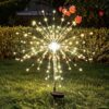 Solar LED dandelion firework stake light, warm white, metal/plastic, for garden patio outdoor decor.