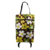 Brown floral polyester foldable shopping cart bag with wheels, white/yellow/green flowers, for groceries.