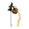 Halloween witch pouring glowing cauldron garden stake, black metal, colorful LED lights, outdoor decor.