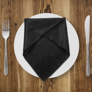 Folded Black Satin Dinner Napkin On White Plate, Elegant Table Setting.
