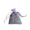 Purple organza sachet filled with dried lavender buds, tied with ribbon, for aromatherapy or freshening clothes.