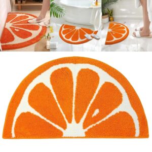 Orange slice half-round bath mat, plush microfiber, vibrant orange and white, for bathroom floor.