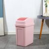 Pink plastic rectangular trash can with red push-top lid, for bathroom or office waste.