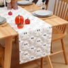 White Fuzzy Knitted Halloween Table Runner With 3D Ghost Pattern, For Festive Dining Decor.