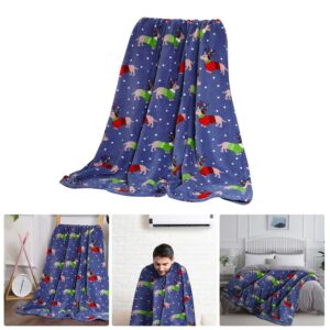 Blue fleece blanket with white polka dots and dachshunds in red/green sweaters, for cozy home use.