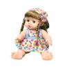 Baby doll with brown braided hair, wearing a colorful polka dot dress and headscarf, for kids' imaginative play.