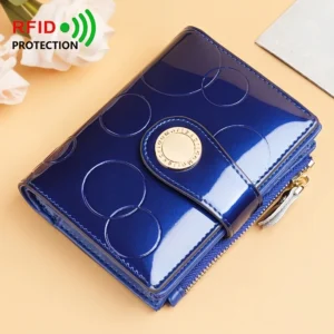 RFID protected glossy navy blue patent leather women's wallet with embossed circles, gold snap closure, and zipper for c