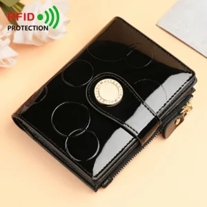 Black patent leather RFID-protected women's wallet with embossed circles, gold snap closure, and zipper for daily use.