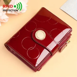 RFID protected red patent leather wallet with embossed circles, gold button closure, and zipper for women.