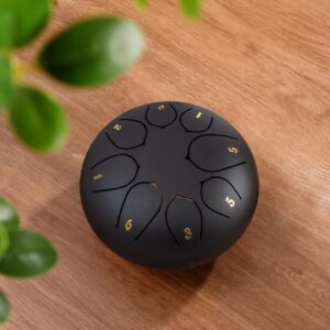 Black Steel Tongue Drum With Gold Numbers, For Meditation And Relaxation.