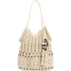 Cream crochet tote bag with open weave, circular patterns, black beads, and tassels for beach or casual use.