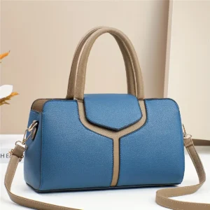 Blue and tan faux leather satchel handbag with top handles and detachable shoulder strap for daily use.