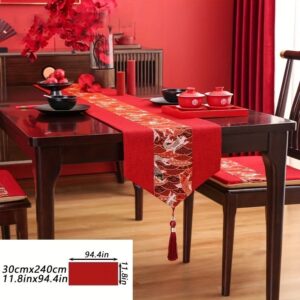 Red linen table runner with gold koi fish pattern and tassel, 11.8x94.4in, for dining table decor.